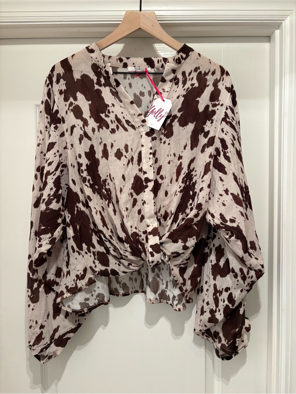 Women’s Yolly Italy brand cow print twist front blouse- one size- NWT
